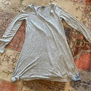 This grey dress with a v neck that is a size medium with long sleeves